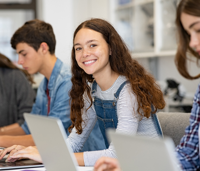 Vesta College London Apprentices Studying In Classroom.